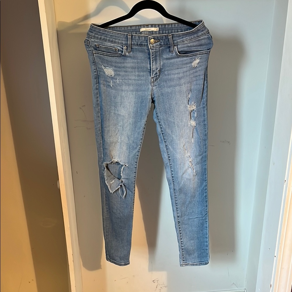 Women's Distressed Blue Jeans